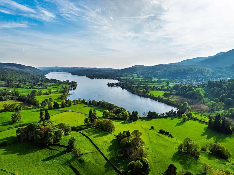 Farms over Coniston Water from drone, Lake District National Park, Cumbria, UK