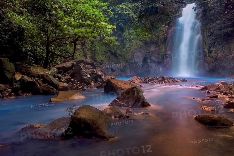 Costa Rica's Rio Celeste is formed through a mix of volcanic effects and the resulting chemicals and particulates that make up the water. I was fortunate to photograph this view (with magical light!) years ago before access was restricted to the waterfall. This shot couldn't be made today without explicitly breaking National Park Service rules