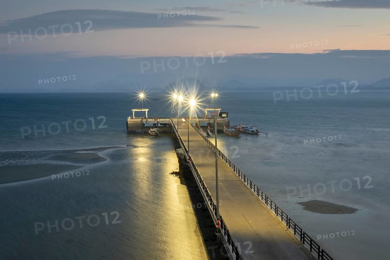 Illuminated jetty at night, harbour at Sivalai Beach, Koh Mook Island, Satun Province, Southern Thailand, Thailand
