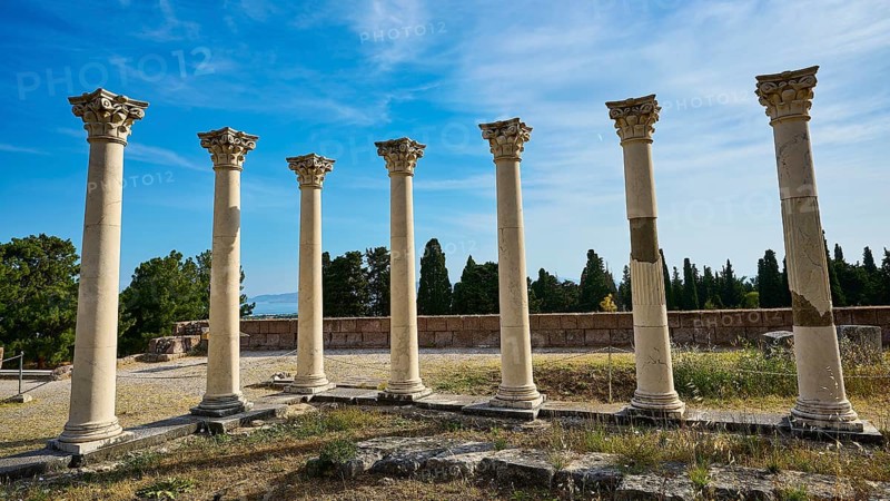 Arrangement of ancient columns against a natural backdrop and blue sky, Temple of Apollo, Corinthian Columns, Asklipion, Asklepieion, Healing Temple, Temple, Hippocrates, Kos, Dodecanese, Greek Islands, Greece