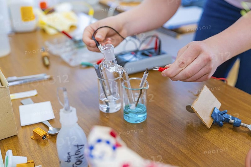 Chemistry laboratory with electrodes in liquid beakers on a table, Battery Research, Nagold, Germany