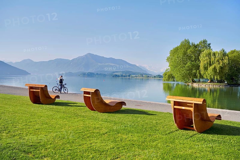 Wooden loungers on Lake Zug, behind the Rigi, Villette, Park, Cham, Canton Zug, Switzerland