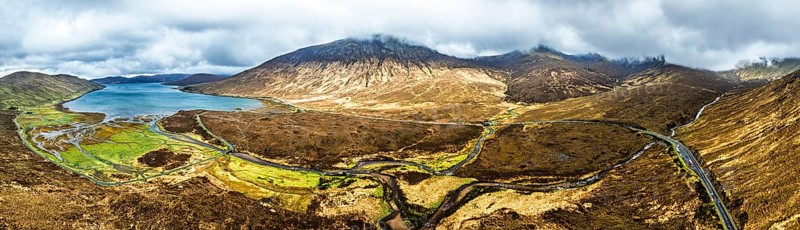 Panorama of Eas a' Bhradain Waterfall from drone, Red Cuillin mountains, Loch Ainort, Isle of Skye, Scotland, UK