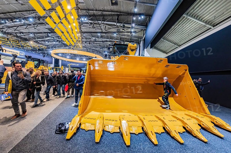 Construction machinery from the US company Caterpilar. BAUMA Munich, 34th World's Leading Trade Fair for Construction Machinery, Building Material Machines, Mining Machines, Construction Vehicles and Construction Equipment. In 2025, the trade fair will attract around 600, 000 visitors from more than 200 countries and regions and 3601 exhibitors. Open-air area with exhibits from Liebherr. Munich, Bavaria, Germany