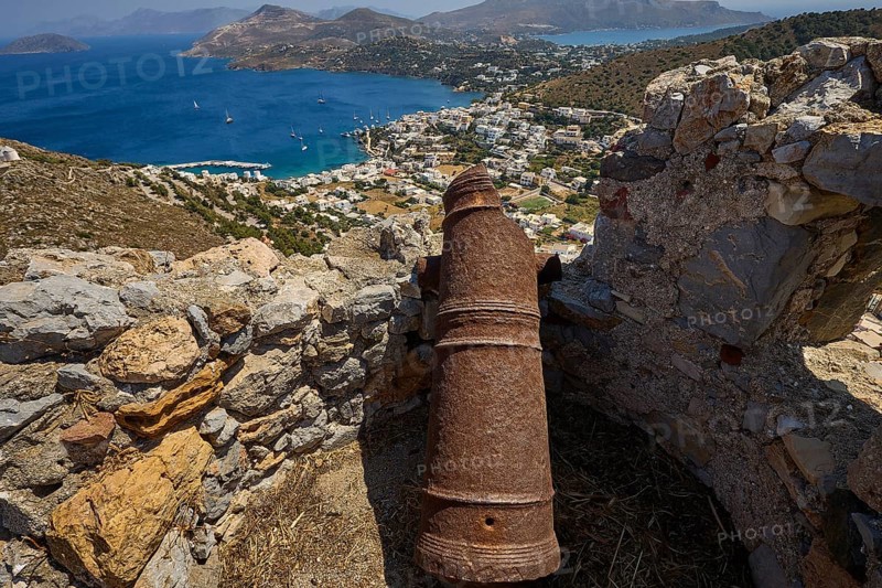 Old cannon on ruins overlooking the sea and surrounding landscape of hills, Pandeli Castle, Castle, Leros Fortress, St John's Fortress, Apitiki Hill, Pandeli Bay, Agia Marina, Leros, Dodecanese, Greek Islands, Greece