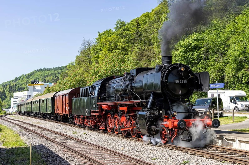 Steam train of the Sauschwänzlebahn steam railway railway steam locomotive at Weizen station, Germany