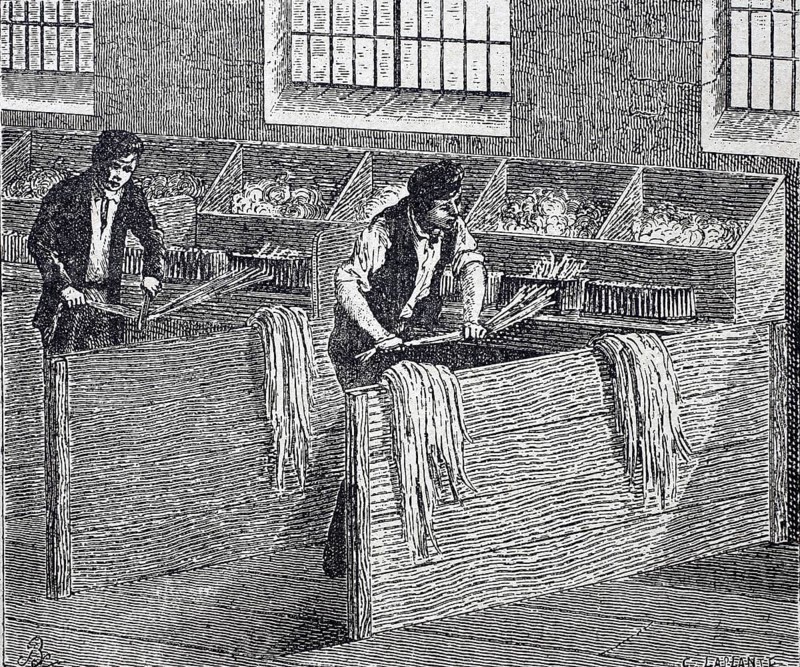 Textile industry, spinning mill, men working on a hand hackle, tool made of wood or metal with vertical metal pins, hackle teeth, used for hackling flax or other fibres, around 1880, digitally enhanced reproduction of a 19th century original, historical, exact date unknown