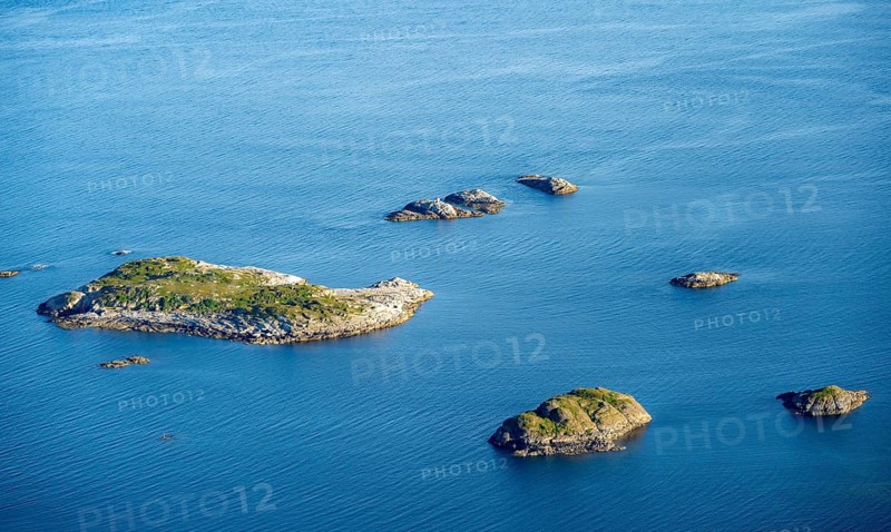 Small rocky islands in the sea, archipelago islands, near Henningsvær, Vågan, Lofoten, Nordland, Norway
