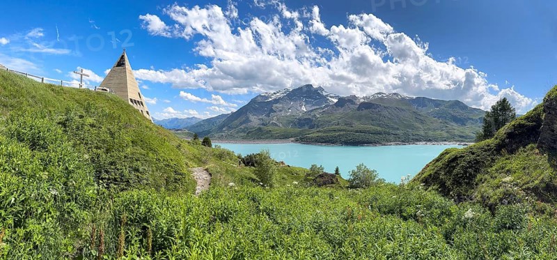Panoramic view from plateau above Lanslebourg-Mont-Cenis to reservoir Lac du Mont Cenis left Museum Musée du Mont Cenis at pass road to pass Alpine pass mountain pass Col du Mont Cenis Colle del Moncenisio, Mont Cenis massif, Massif du Mont-Cenis, Graian Alps, Lanslebourg, Rhone-Alpes, France