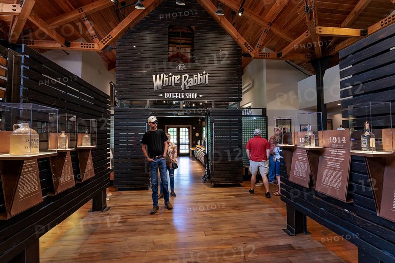 Visitors looking at display in the museum of the Jack Daniel Distillery in Lynchburg, Tennessee