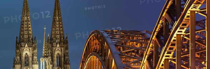 Cologne Cathedral and the Hohenzollern Bridge illuminated with LED lights, Cologne, North Rhine-Westphalia, Germany