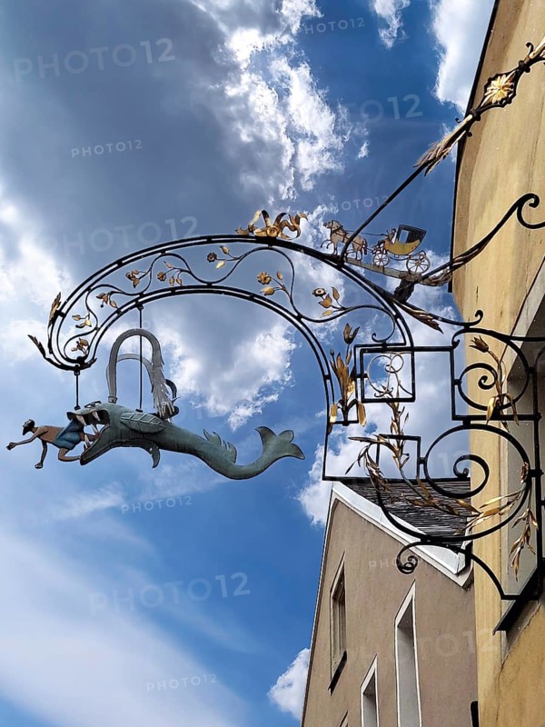 Nose sign Gasthaus Zum Walfisch, figure of Jonas and the whale, Unter den Schwibbögen 21, Regensburg, Upper Palatinate, Bavaria, Germany
