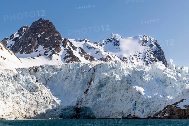 Glacier tongue, ice, edge, mountain peak, sea, Fugelfjorden, Spitsbergen, Svalbard