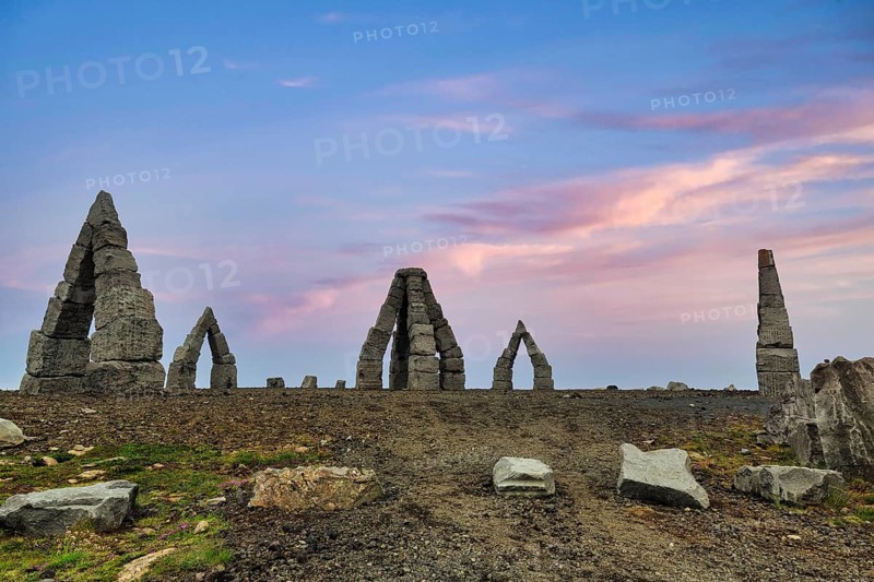 Arctic Henge, large stone gates, basalt, landmark in barren landscape, Heimskautsgerði, Heimskautsgerdi, artist Erlingur Thorodsen, evening sky, Raufarhöfn, Melrakkasletta, North-East Iceland, Iceland