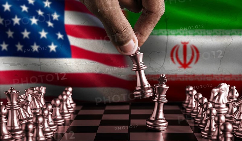Political tension between USA and Iran. Iran vs USA flag on chessboard. Iran territory conflict