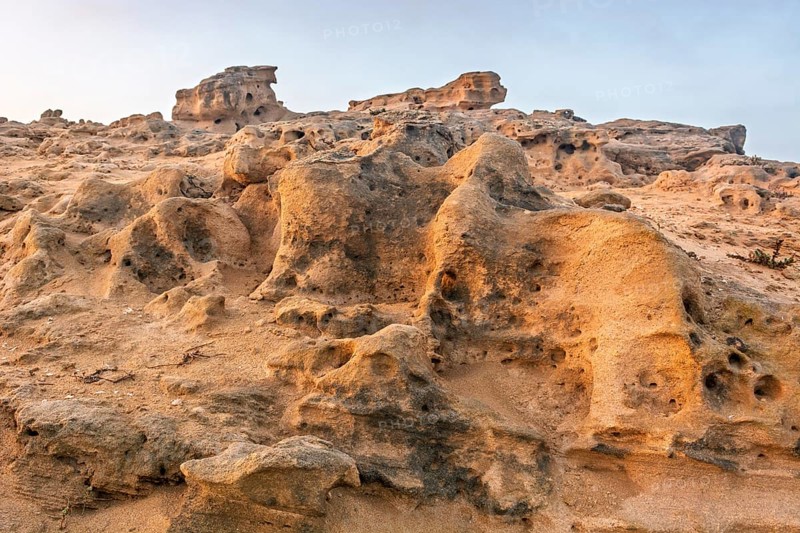 A rocky area with a hole in the ground. Rabat, Morocco