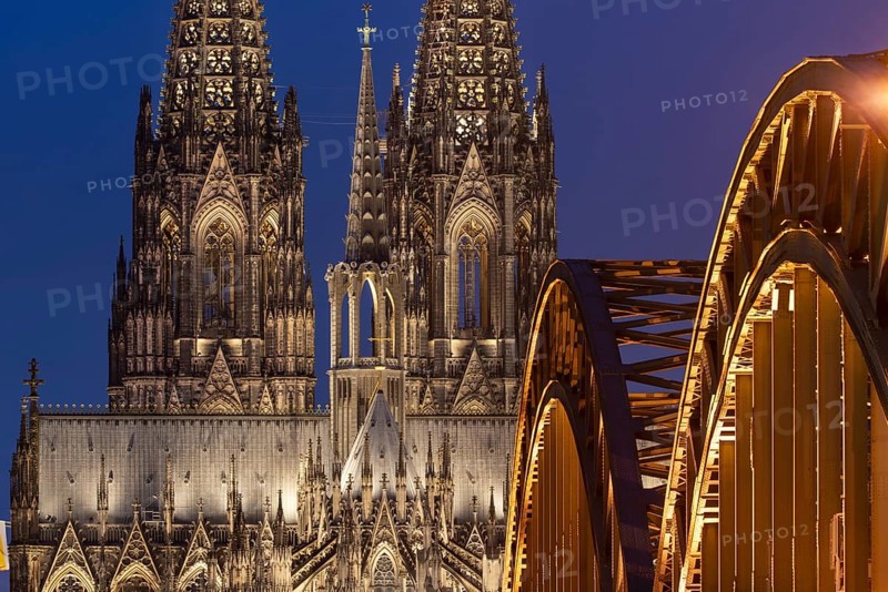 Cologne Cathedral and the Hohenzollern Bridge illuminated with LED lights, Cologne, North Rhine-Westphalia, Germany
