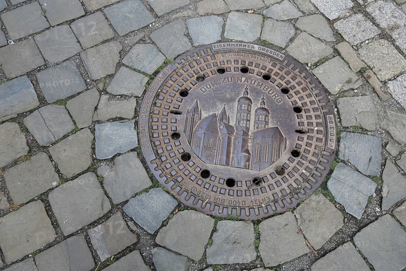 Manhole cover with cathedral as landmark, cobblestones, floor, inscription, cathedral square, Saale, Naumburg, Saxony-Anhalt, Germany