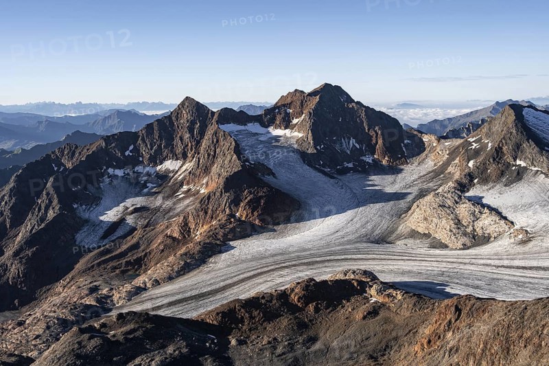 Picturesque high mountain landscape at sunrise, glacier and rocky mountain peaks in the morning light, view of the Königshofspitz mountain peak and Übeltalferner glacier at Becher, Stubai Alps, South Tyrol, Italy