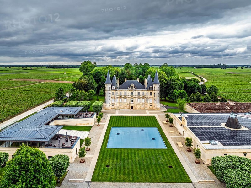 Chateau Pichon Longueville Baron Vineyard and grape fields around Pauillac from a drone, Bordeaux, Gironde, Nouvelle-Aquitaine, France