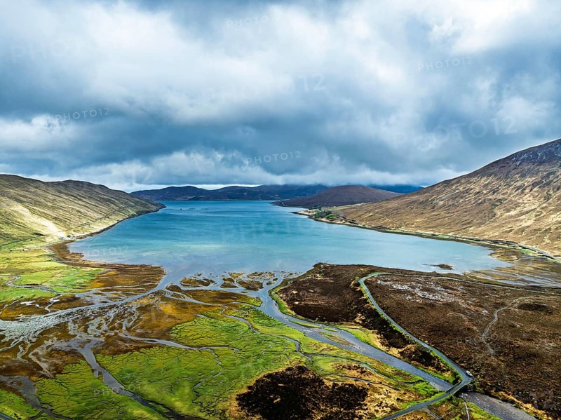 View from Eas a' Bhradain Waterfall from drone, Red Cuillin mountains, Loch Ainort, Isle of Skye, Scotland, UK
