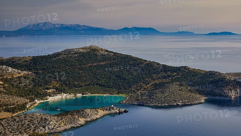 Coastal landscape with hills and blue water under a clear sky, Holy Week, Panormitis Bay, Panormitis Monastery, Symi, Dodecanese, Greek Islands, Greece