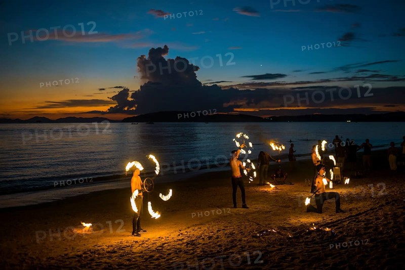 Fire show, jugglers with fire, Ao Nang Beach, sunset, Ao Nang, Krabi, Thailand