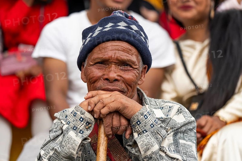 JOWAI, INDIA - JULY 14: People from the Pnar community attend the Behdienkhlam festival in Jowai, India on July 14, 2025. Behdienkhlam is a vibrant annual festival celebrated by the Pnar (Jaintia) community of Meghalaya, especially in Jowai, to drive away plague and diseases and to pray for a good harvest. Observed in July after the sowing season, it features traditional rituals, offerings to ancestral spirits, and the grand procession of beautifully decorated bamboo structures called rots, which are later immersed in a sacred muddy pool known as Ka Aitnar