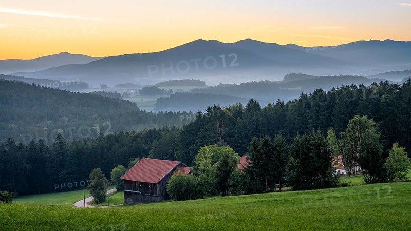 Landscape with forest, meadows and mountains around the town of Bad Kötzting, with the Kaitersberg in the centre. In the morning in front of sunrise. District of Cham, Upper Palatinate, Bavarian Forest, Bavaria, Germany