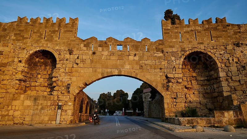 Arsenal gate, Rhodes city wall, Historic stone city gate in evening light, Harbour area, Rhodes city, Rhodes, Dodecanese, Greek Islands, Greece