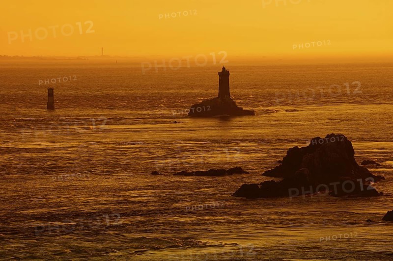 Phare de la Vieille lighthouse at sunset, Pointe du Raz, Cap Sizun, Finistere department, Brittany, France