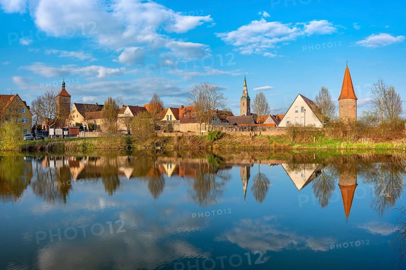 View of the old town in the evening light, Upper Tor, Liebfrauenmünster and Bürgerturm reflected in the town pond, Wolframs-Eschenbach, Middle Franconia, Bavaria, Germany