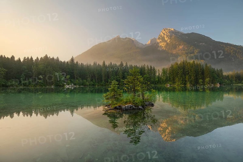 Magical sunrise with fog at Hintersee near Ramsau in Berchtesgadener Land