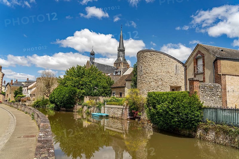 Moat in Bonneval with the church of Notre-Dame, Centre-Val de Loire, France