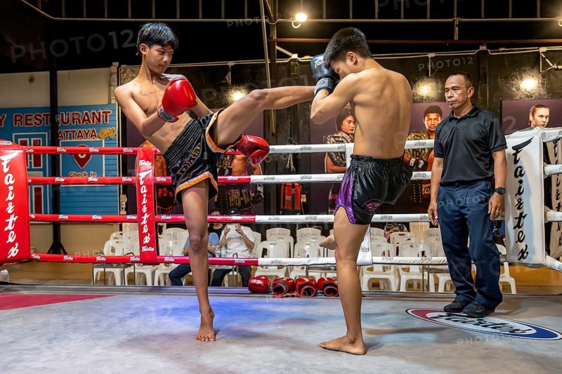 Thai boxing Muai Thai boxer in action, Pattaya, Thailand