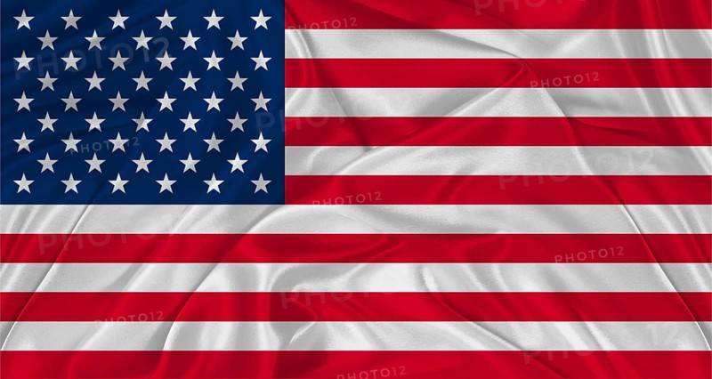 Flag of USA with cloth texture. Close up of American flag waving