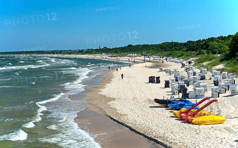 Waves wash up on the sandy beach in the Baltic seaside resort of Heringsdorf, Usedom Island, Mecklenburg-Western Pomerania, Germany