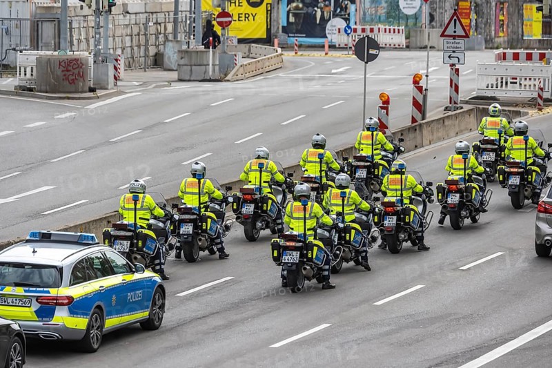 Police motorbike squadron driving through the construction sites of Stuttgart. Stuttgart, Baden-Württemberg, Germany