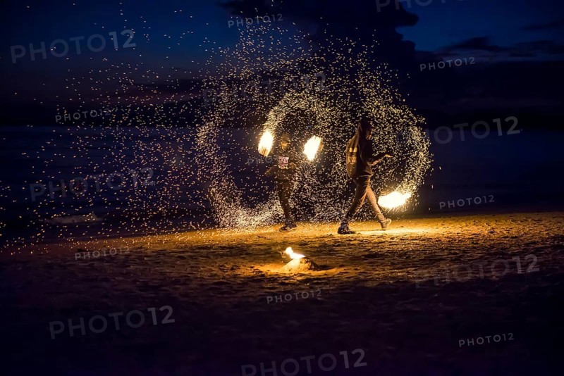Fire show, jugglers with fire, Ao Nang Beach, sunset, Ao Nang, Krabi, Thailand
