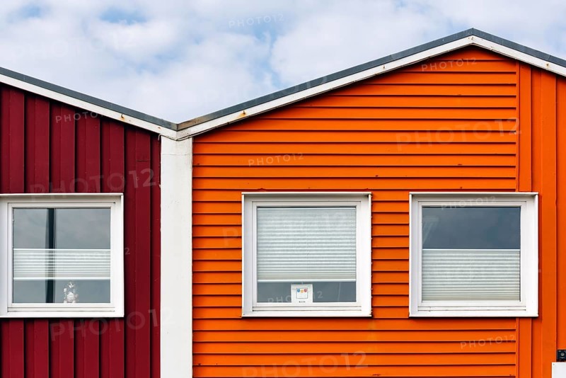 Colourful lobster huts, wooden façade with three windows, façade detail in the harbour, Heligoland, Schleswig-Holstein, Germany