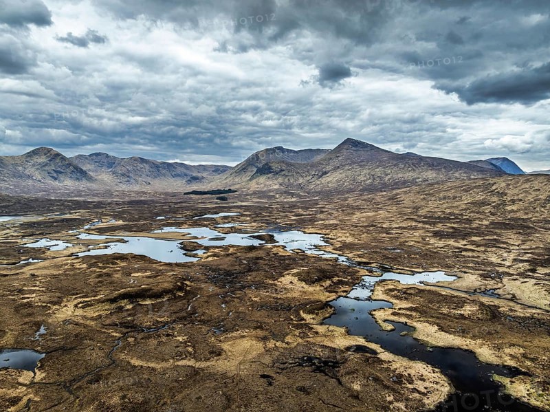 Rannoch Moor from a drone over Loch Ba and Loch of the Armpit, A82 Highland Way, Argyll and Bute, West Highlands, Scotland, United Kingdom