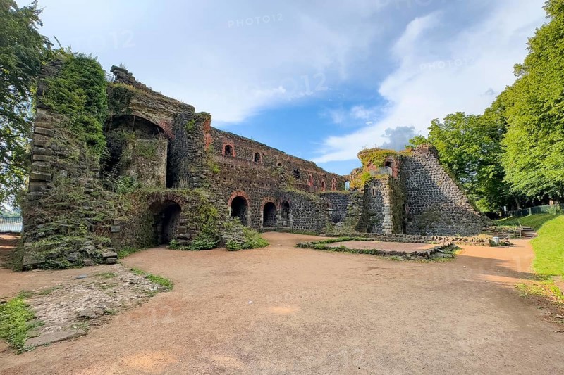 Ruins of the imperial palace of Emperor Frederick I Barbarossa, built in the Middle Ages around 1184 on today's banks of the Rhine, in the foreground small model of the original fortress building, Kaiserswerth, Düsseldorf, North Rhine-Westphalia, Germany