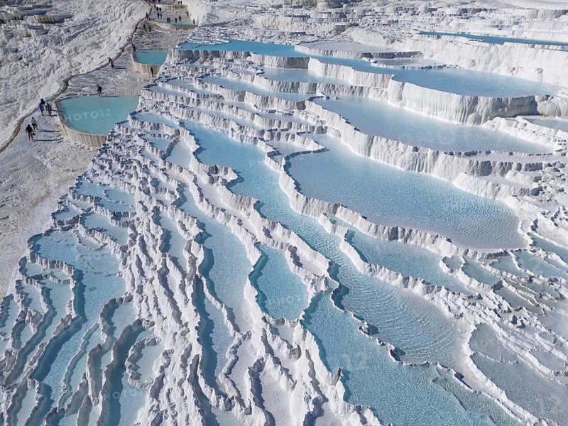 Detailed photo of cascading limestone terraces with turquoise-coloured water, aerial view, sinter terraces, limestone terraces, travertine terraces, Pamukkale, Denizli, UNESCO World Heritage Site, Anatolia, Turkey