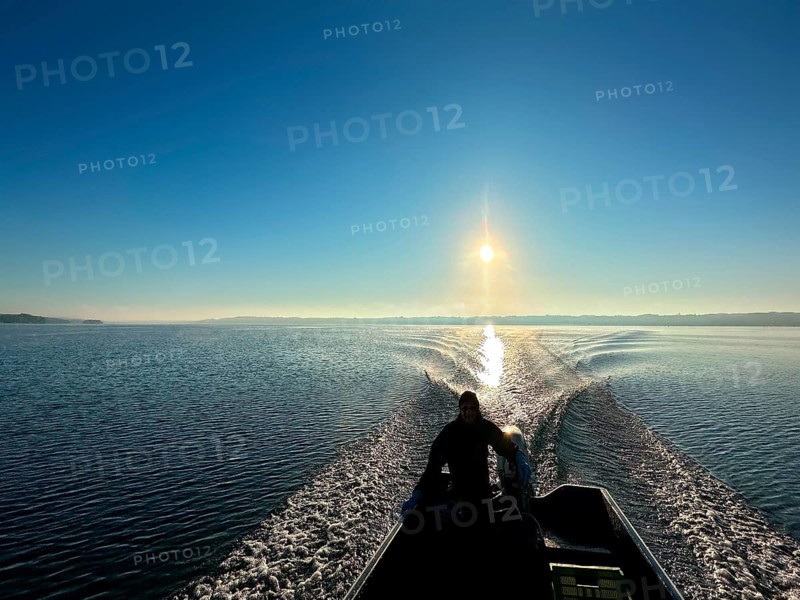 View from a motorboat over Lake Starnberg, Bavaria, Germany