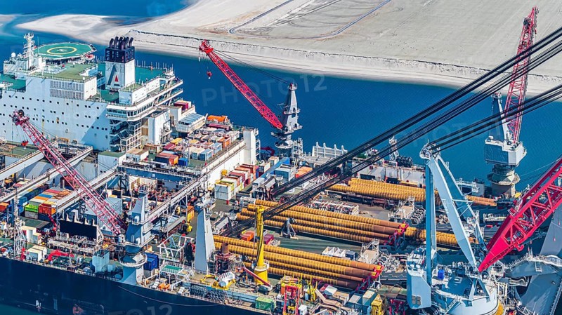 Pioneering Spirit. Workboat of the Swiss offshore service provider Allseas. The world's largest workboat for laying pipelines. It is the largest ship ever built in terms of gross tonnage and width. It is 382 metres long and 123 metres wide. From the end of 2018, it was busy laying the Nord Stream 2 pipeline in the Baltic Sea. Maasvlakte 2 deep-sea harbour, Rotterdam, Zuid-Holland, Netherlands