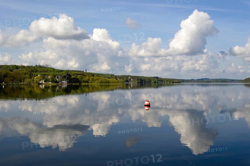 View over the Möhnesee, Möhnesee tower, red and white buoy, blue cloudy sky, reflection on the water surface, Möhnetalsperre, North Rhine-Westphalia, Germany