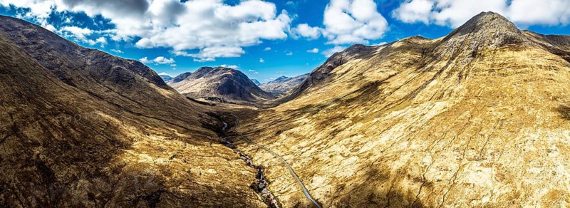 Panorama of Mountains and Moors over Glen Etive Valley from a drone, Buachaille Etive Mòr, The Buachaille, Highlands, Scotland, United Kingdom