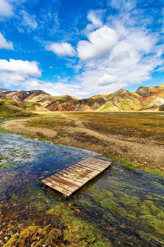 Volcanic landscape, colourful rhyolite mountains, ford, Cumulus, Landmannalaugar, remote hiking area in Fjallabak nature reserve, Laugavegur hiking trail, Suðurland, Sudurland, Icelandic highlands, Iceland