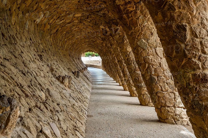 Colonnaded footpath, Park Gueell, Antonio Gaudi architect, Unesco World Heritage Site, Gracia District, Barcelona, Catalonia, Spain