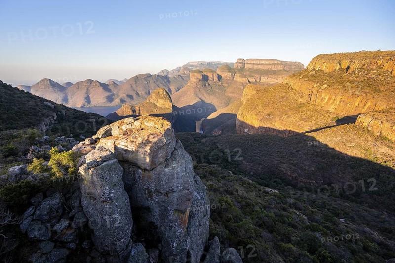 Sunset at Blyde River Canyon with Three Rondawels peak, view of canyon with Blyde River and table mountains in the evening light, canyon landscape, Panorama Route, Mpumalanga, South Africa